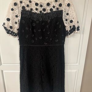 SHANI Black/White lace appliquéd dress with delicate flowers.